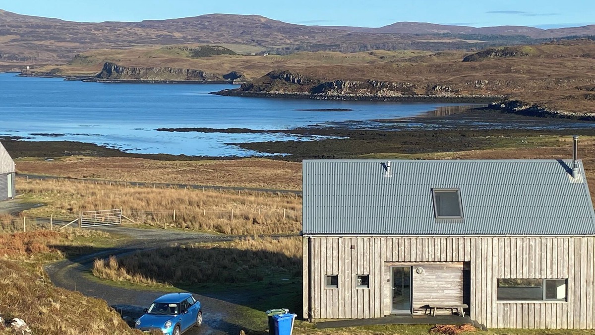 Skinidin House | Architect designed eco house with stunning loch and Mountain Views