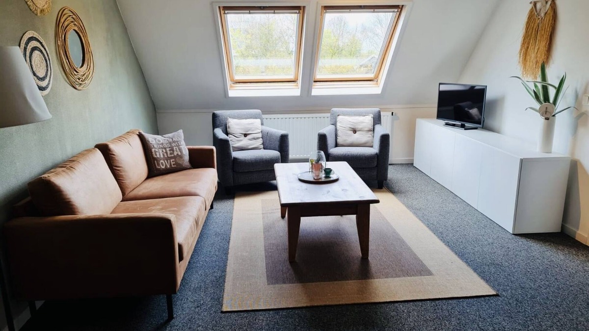 Sneek Apartment | Attractive apartment with bedroom in completely converted farmhouse
