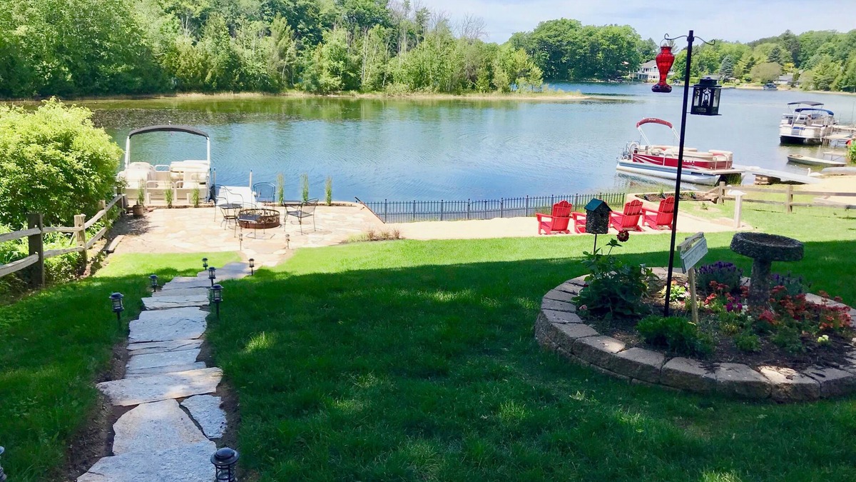 Traverse City Cabin | Authentic Log Cabin on Beautiful Silver Lake. Pet Friendly!