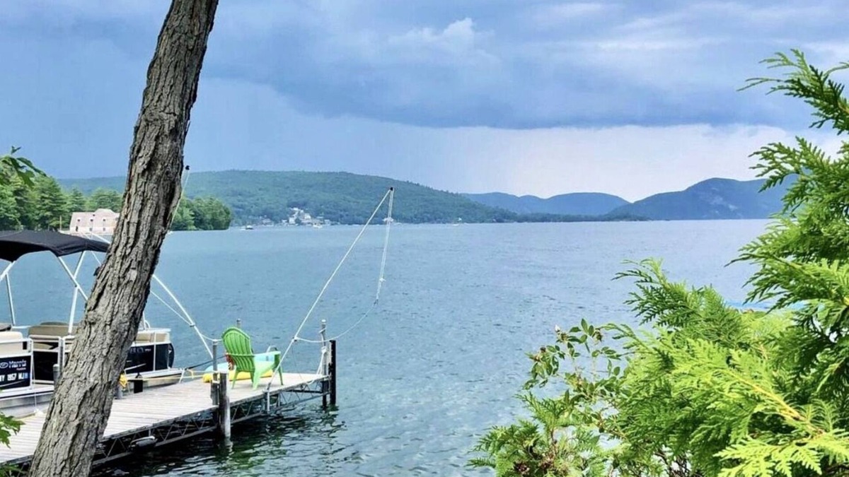 Warren County Cabin | Authentic seasonal 1950’s Adirondack live edge /knotty Pine waterfront cabin.