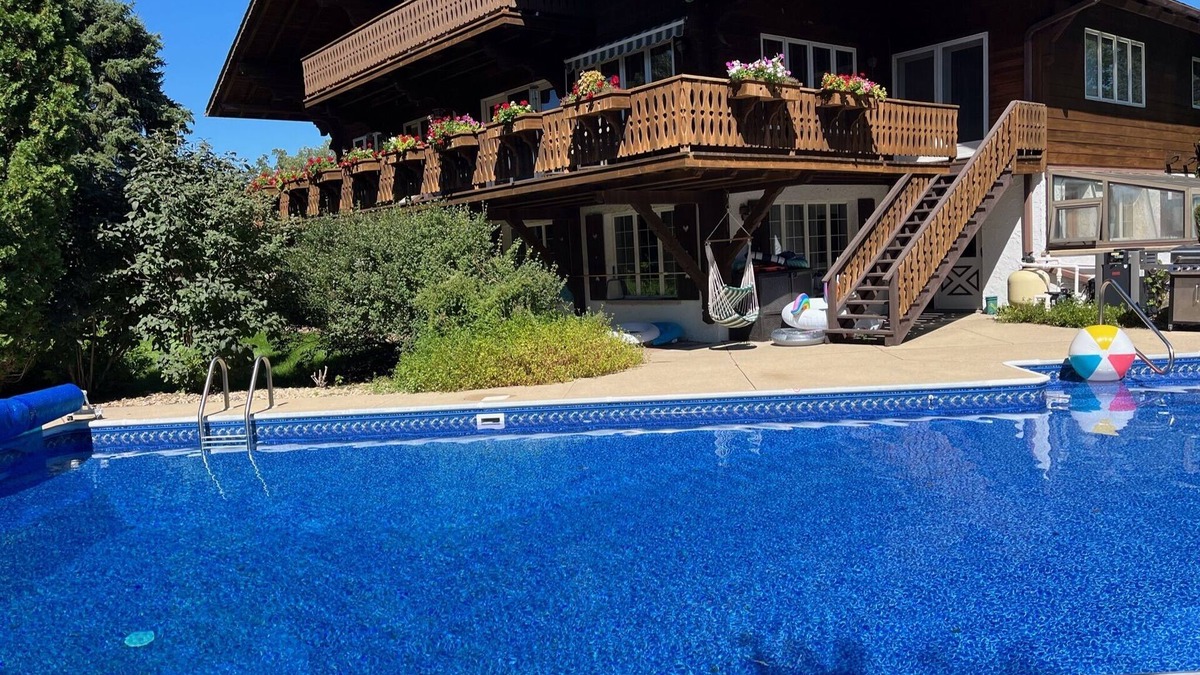 New Glarus House | Authentic Swiss Chalet w/private saltwater pool, sauna, grill, fire pit & more