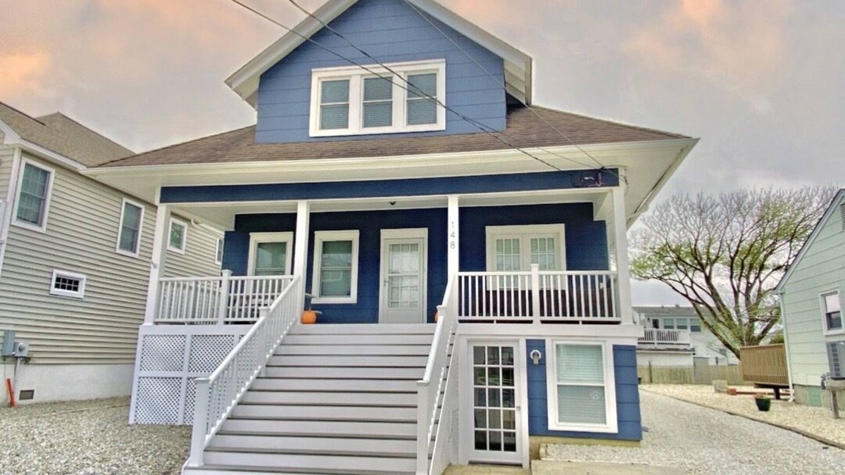 Avalon House | Avalon Beach House! Great Location! Enjoy your morning coffee or a glass of wine in the evening on the inviting covered porch.