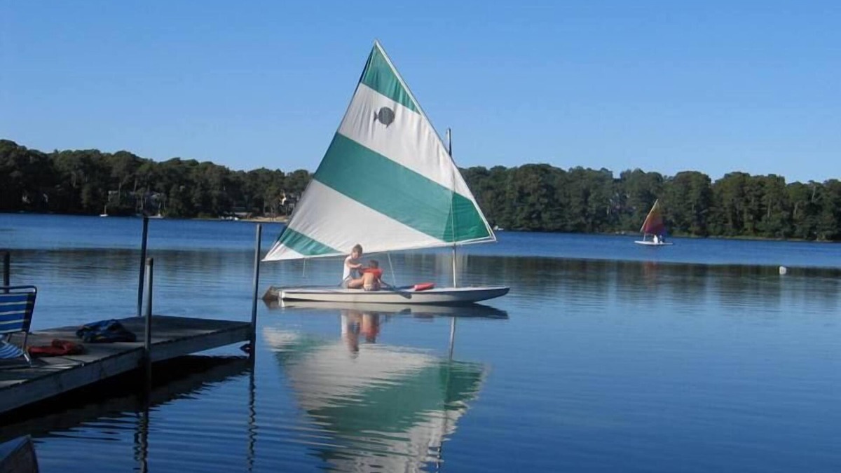 Harwich Cottage | Avoid crowds with private lakefront beach perfect for large groups!