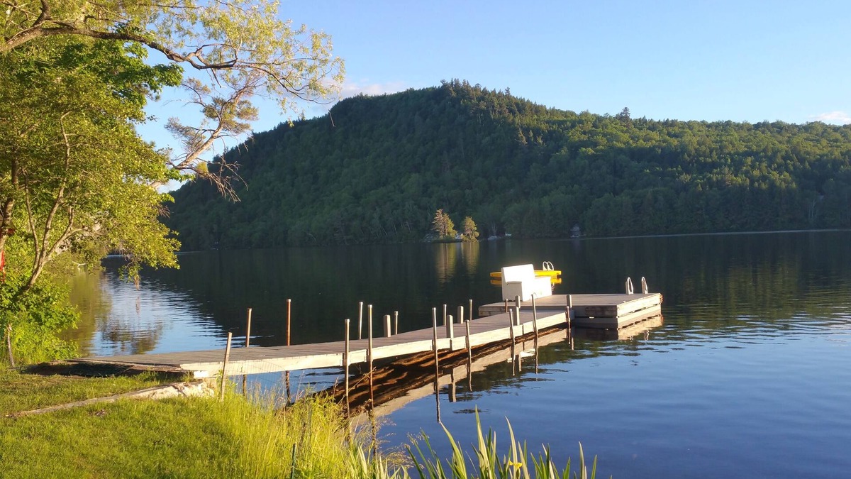 Bryant Pond House | Awesome unique home right on the lake with huge yard, hot tub near Sunday river
