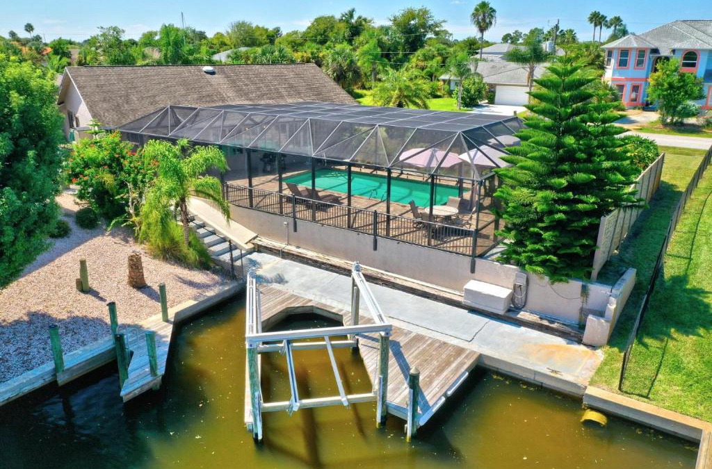 Palm Harbor House | Bahama Haven Saltwater Canal Pool Home w dock and boat lift