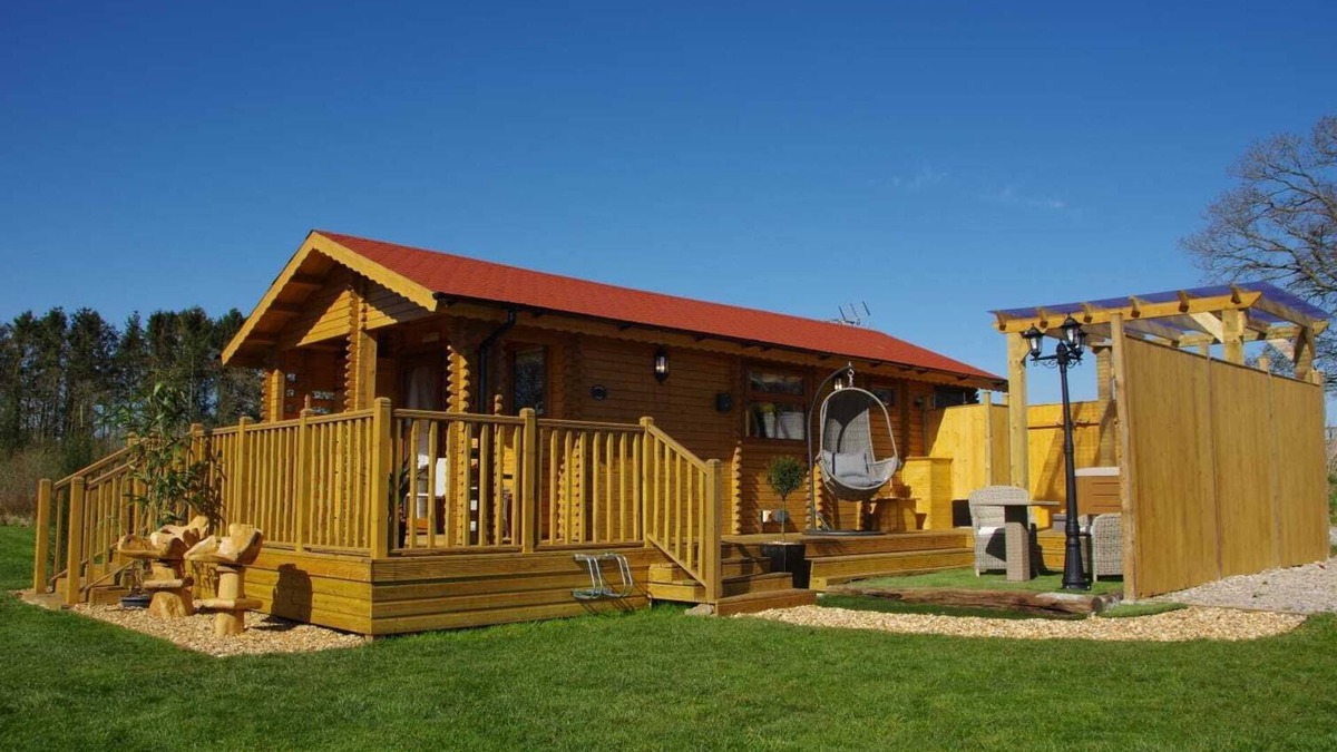 Welsh Frankton Cabin | Balmoral Studio Lodge 2 Birth Log Cabin With Lake Views & Private Hot Tub