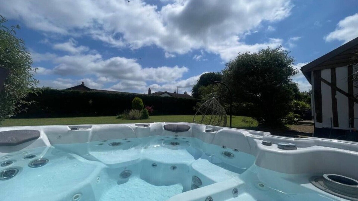 Roydon House | Barn in quiet location yet close to local amenities. Hot tub and games room.