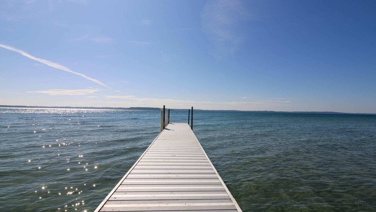 Suttons Bay House | Bayside Serenity with Hot Tub! Dog Friendly!