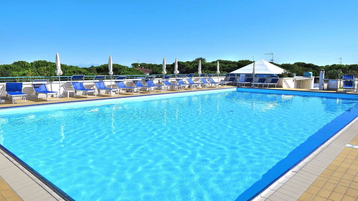 Bibione Pineda Apartment | Beautiful apartment for 6 guests with pool, A/C, TV, terrace and parking