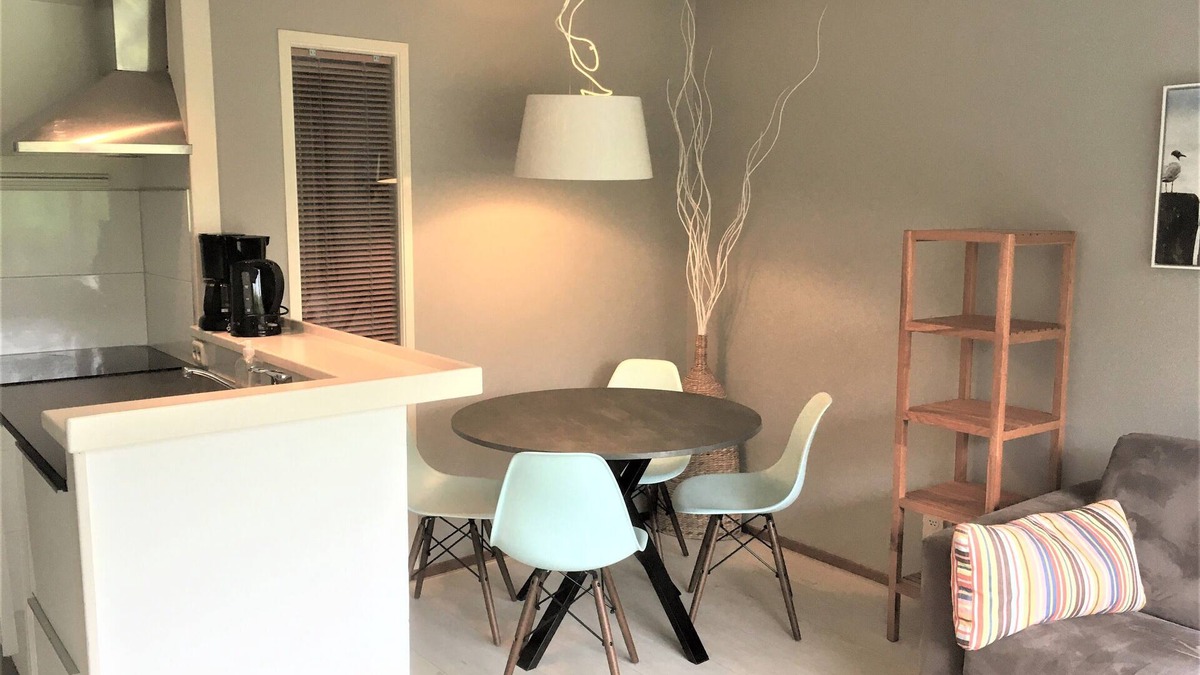 Hollum Apartment | Beach 1 km, on site resort with covered swimming pool, playground, tennis