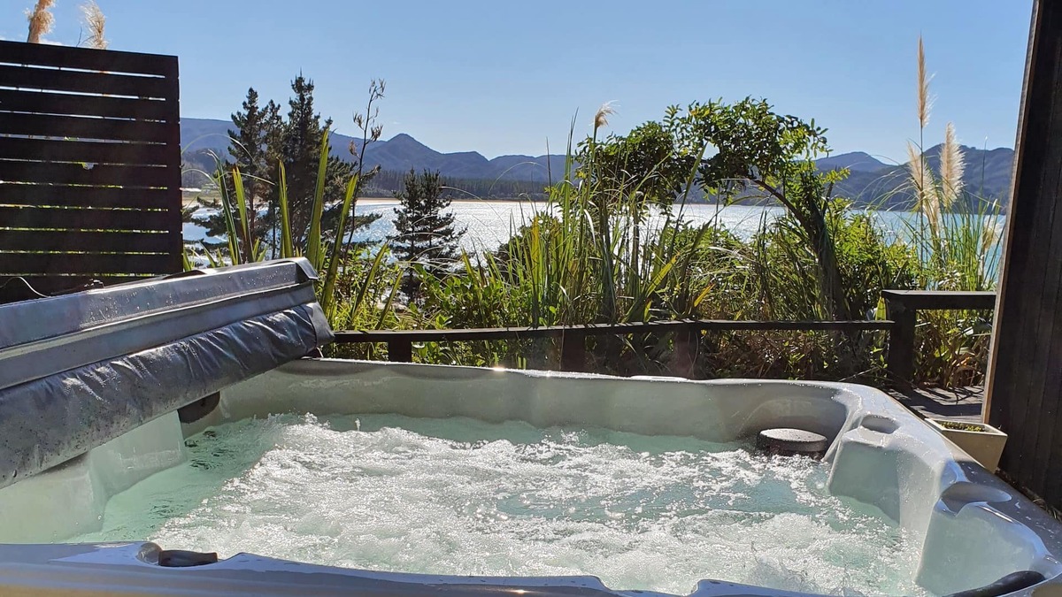Kennedy Bay House | Beach, Bush, Birdsong and stunningly Beautiful views...with a touch of luxury.