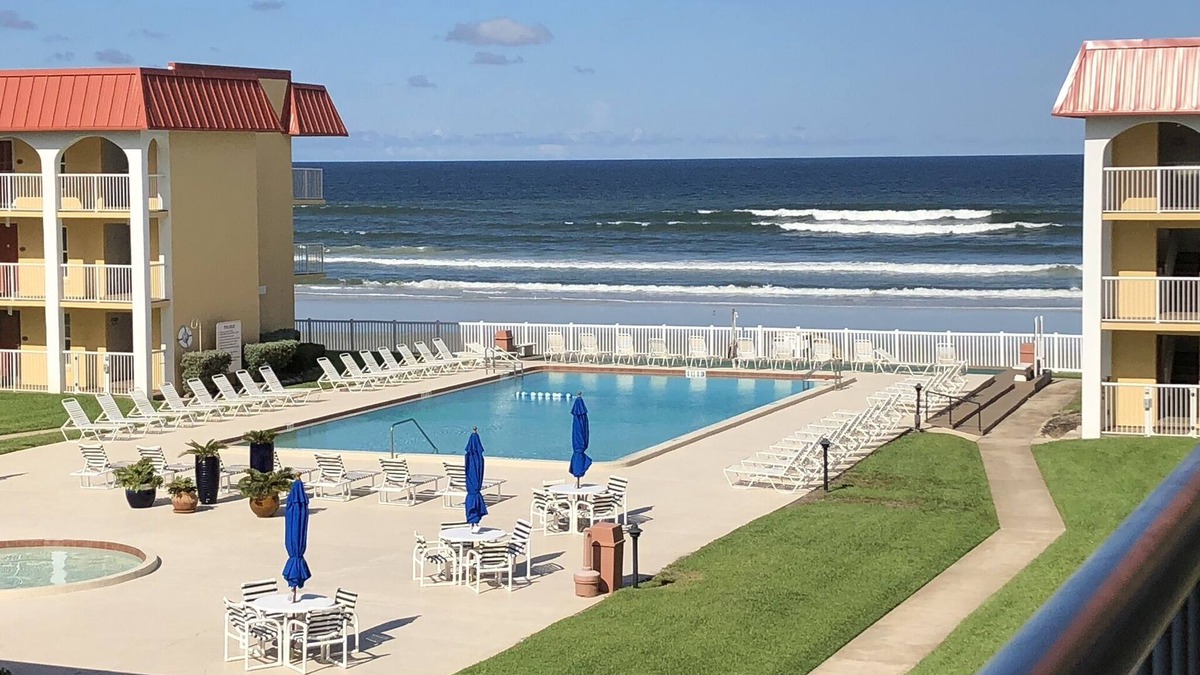 Point East Condo | Beach front condo with ocean views and community pool. 2/2 on non drive beach.