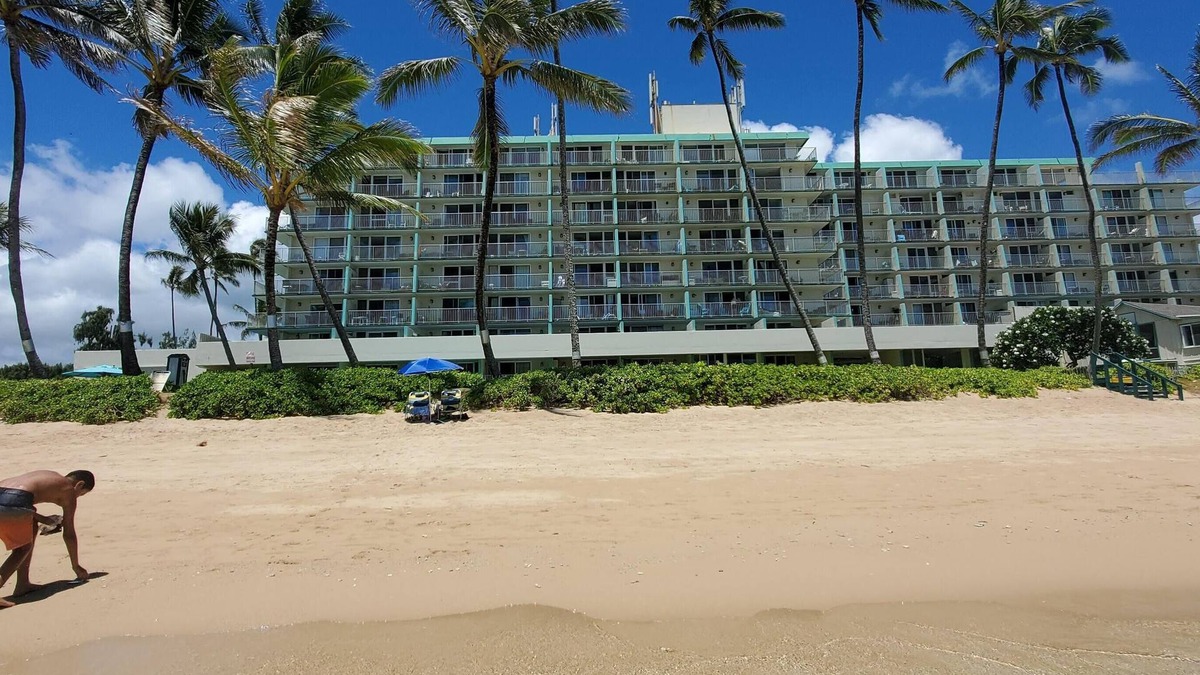 Punaluu Condo | Beach Front Condo w/Beautiful Sunrises on Private Sandy Beach with Calm & Gentle Waves