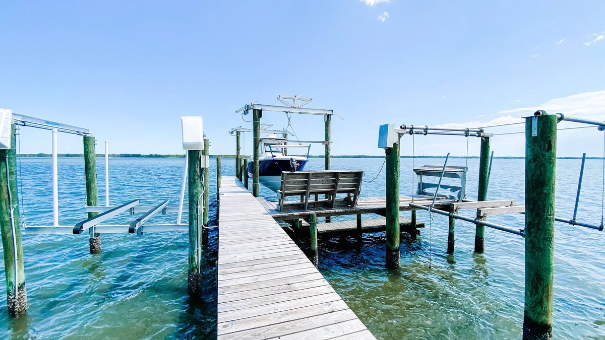 Alligator Point House | BEACH FRONT to BAY with boatdock, swimming pool, pickleball courts and kayaks.
