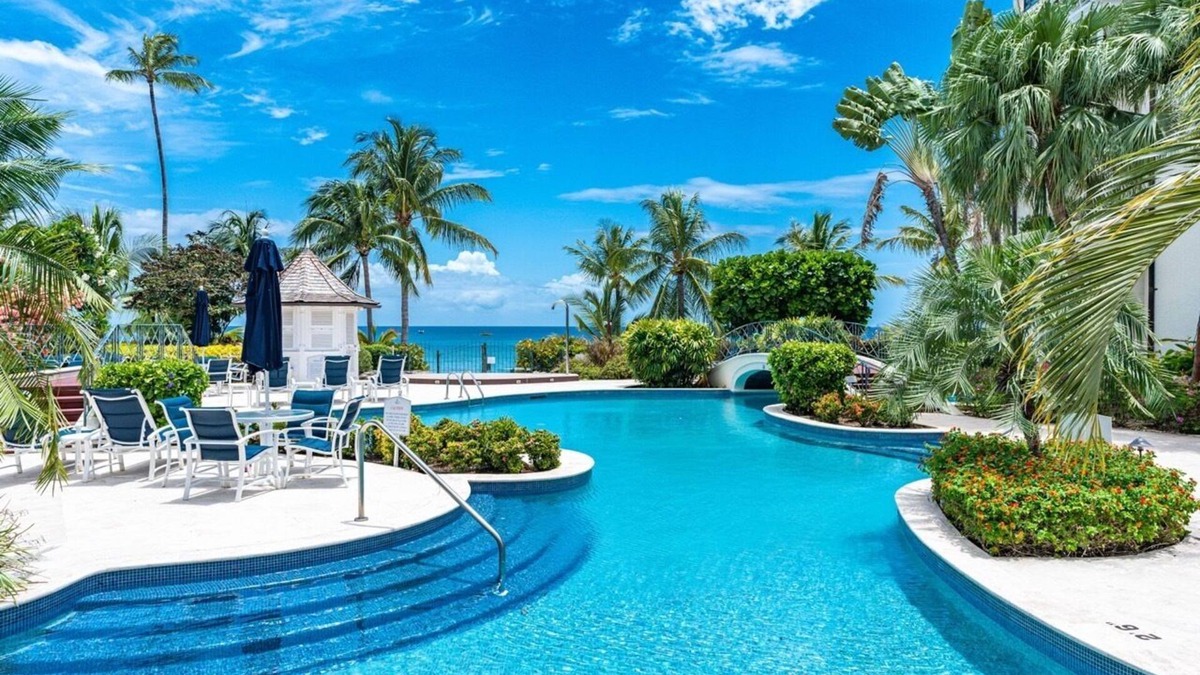 Schooner Bay Apartment | "Beach Happy" Beachfront Apartment by One Caribbean Estates