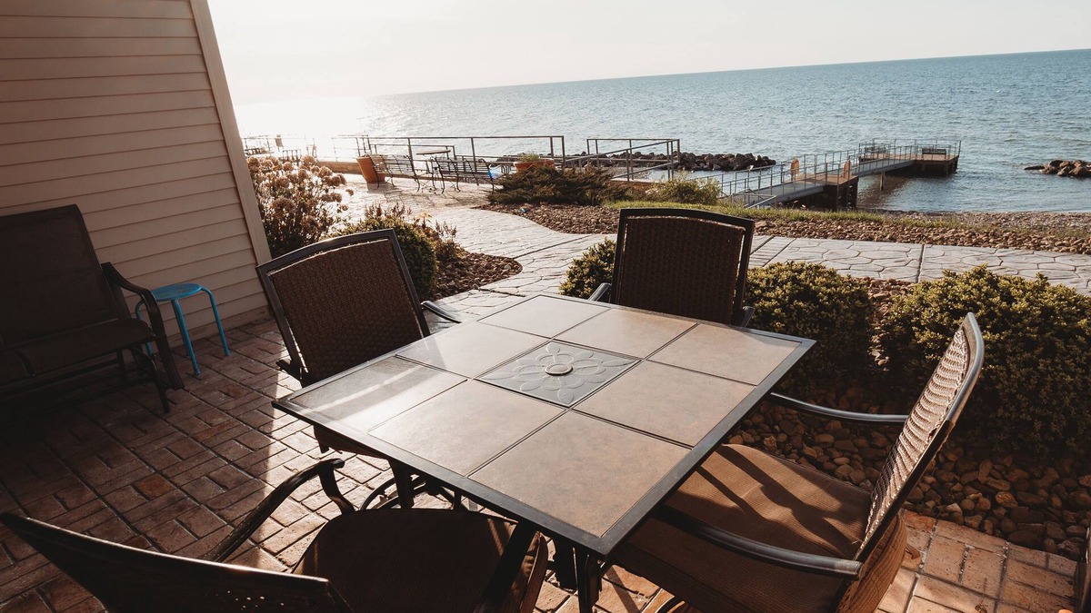 Geneva-on-the-Lake Condo | BEACH LEVEL CONDO L08 -2 BR/2 BA Walk right out to the Private Beach!
