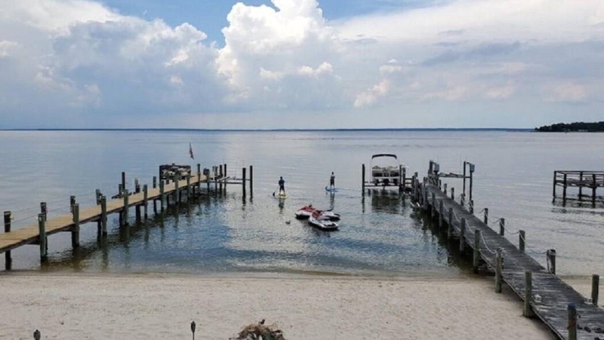 Mount Holly House | Beach & River Retreat. Spectacular house with private sand beach and hot tub!