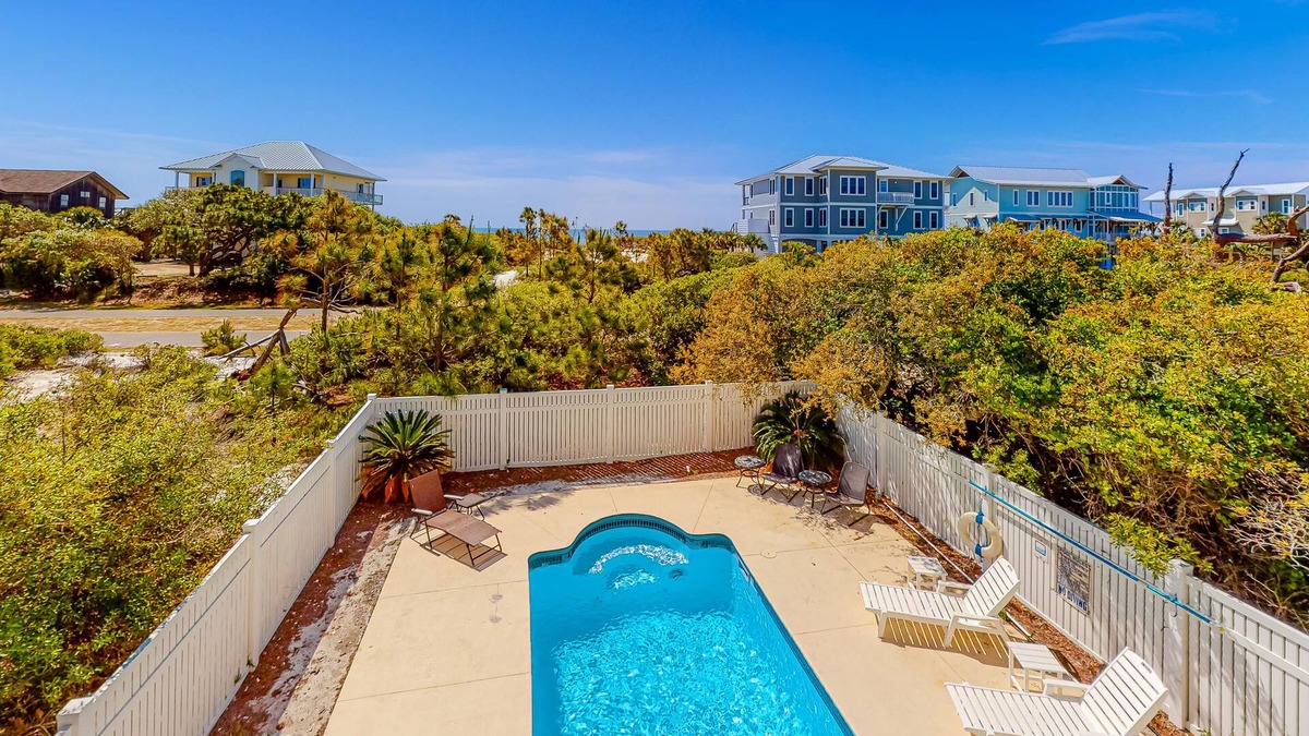 Treasure Beach Village House | Beach view dog-friendly home with a pool, tennis, fireplace, washer/dryer, grill