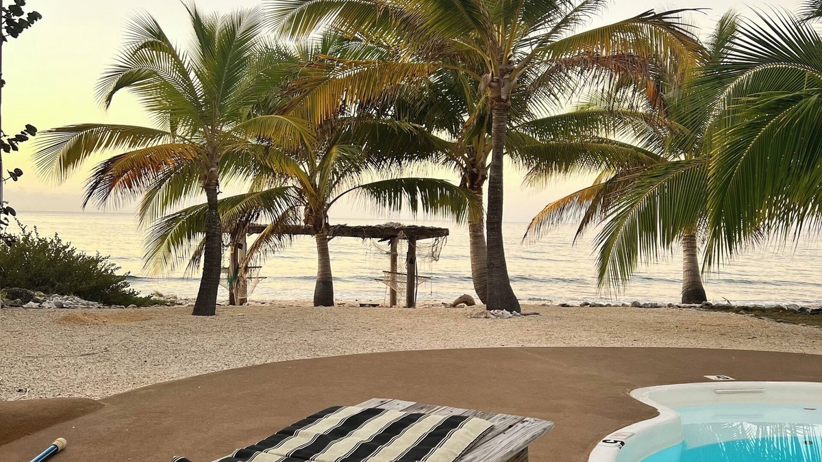 West End Apartment | Beachfront 2-bdr 2-bath "Sunshine Aloha Suite" 100 ft from the Ocean with Pool!