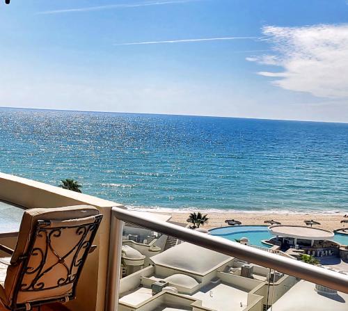 Sandy Beach Apartment | Beachfront Condo on Sandy Beach, Las Palmas Resort, 24hrs Security, Free Parking, Free Wi-Fi