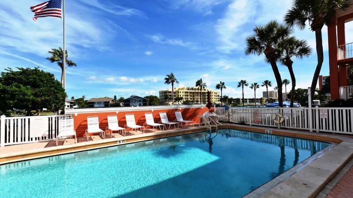 Siesta Key Condo | BEACHFRONT CONDO - THREE BEDROOM - HEATED POOL - FREE BOAT DOCKS - RENOVATED