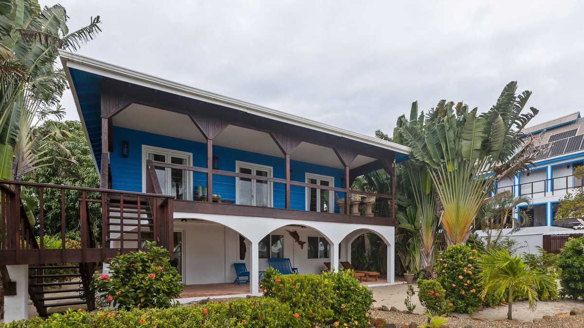 Caribbean Way House | Beachfront home with dock, deck, hammocks, strong WiFi, AC & sea view