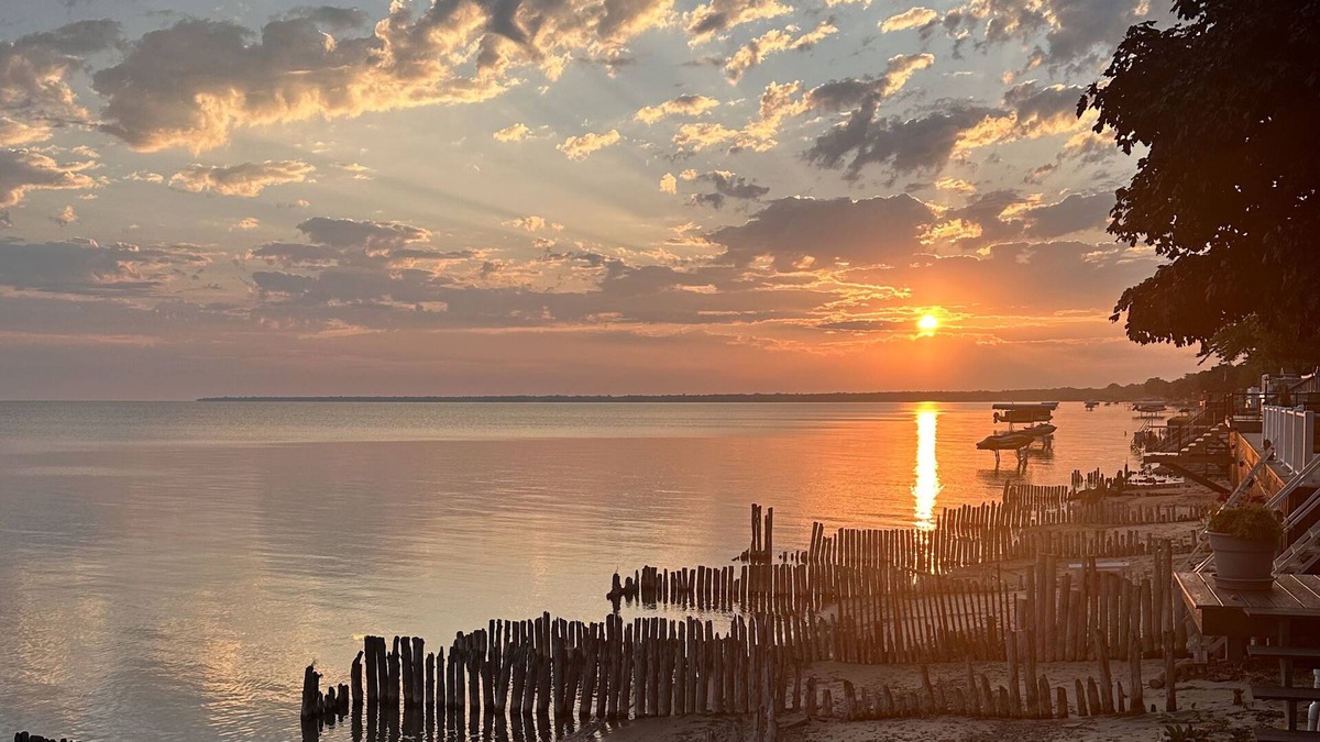 Caseville Township House | Beachfront lake house with large deck, beach bonfire & stunning views!