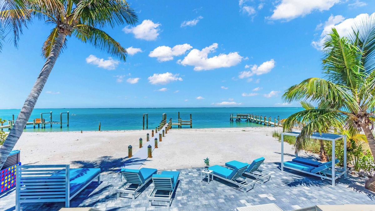 North Captiva House | “BEACHFRONT” LUXURY ISLAND HOME. PRIVATE SWIM SPA~DOCK FISHING~GolfCart STUNNING