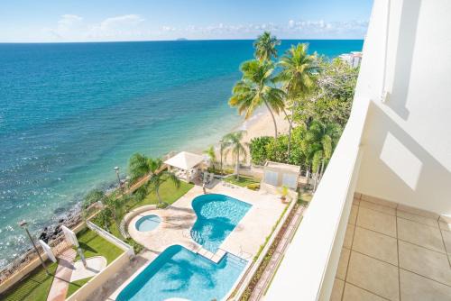 Stella Apartment | Beachfront Penthouse with Ocean and Sunset Views at Pelican Reef #703