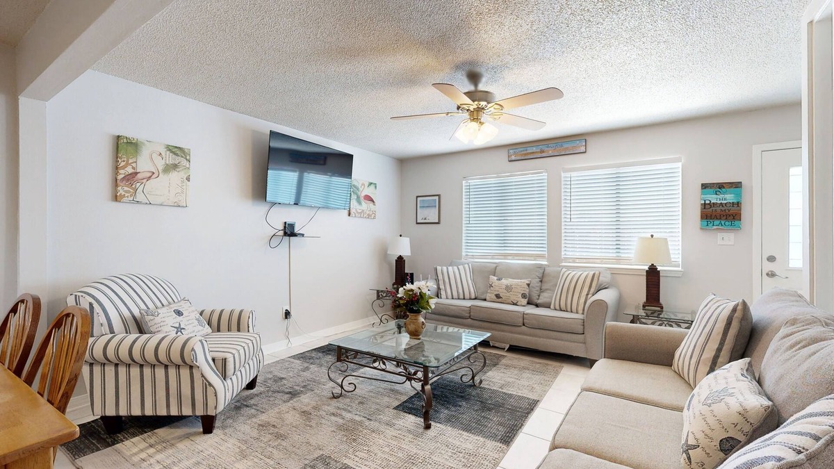 Sugar Beach House | Beachfront townhome w/on-site beach access, heated pool, patio, grill, AC, W/D