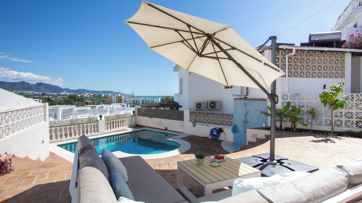 Punta Lara House | Beachfront villa for 6 in Nerja Punta Lara with private pool, sea and garden views. Mountain view