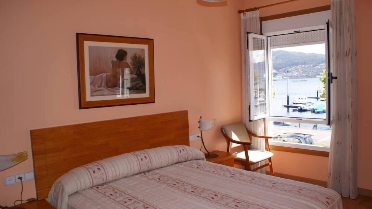 Moana House | Beachfront villa with private garden and patio and free parking on the street.