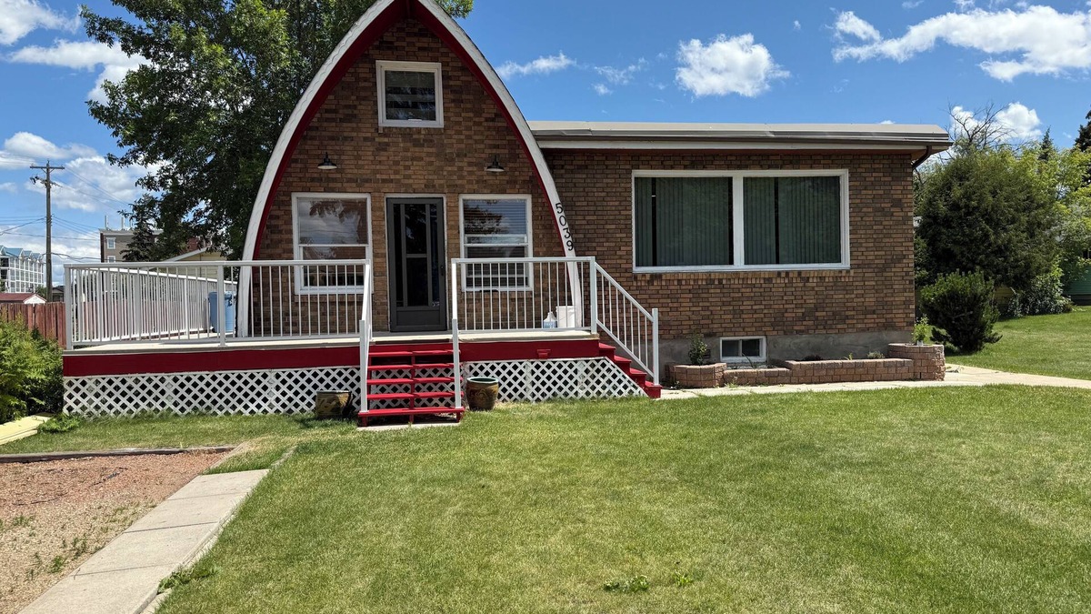 Sylvan Lake Cabin | Beachy Keen 2 steps away from lake where rustic meets charm. Pet friendly.