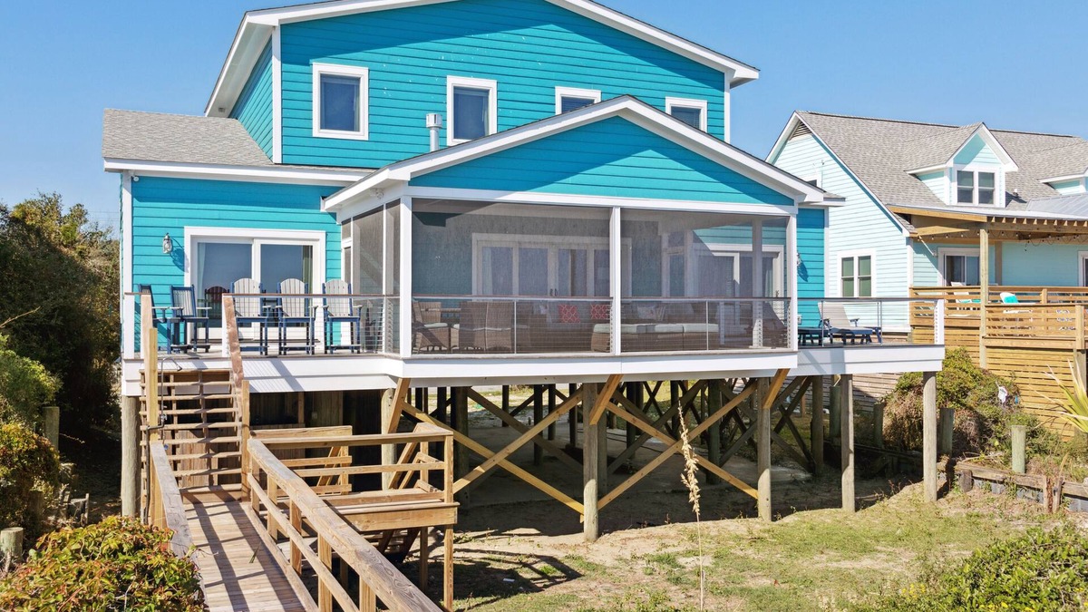 Folly Beach House | BeachZilla! Oceanfront Pet Friendly! Screen Porch with Dining Area