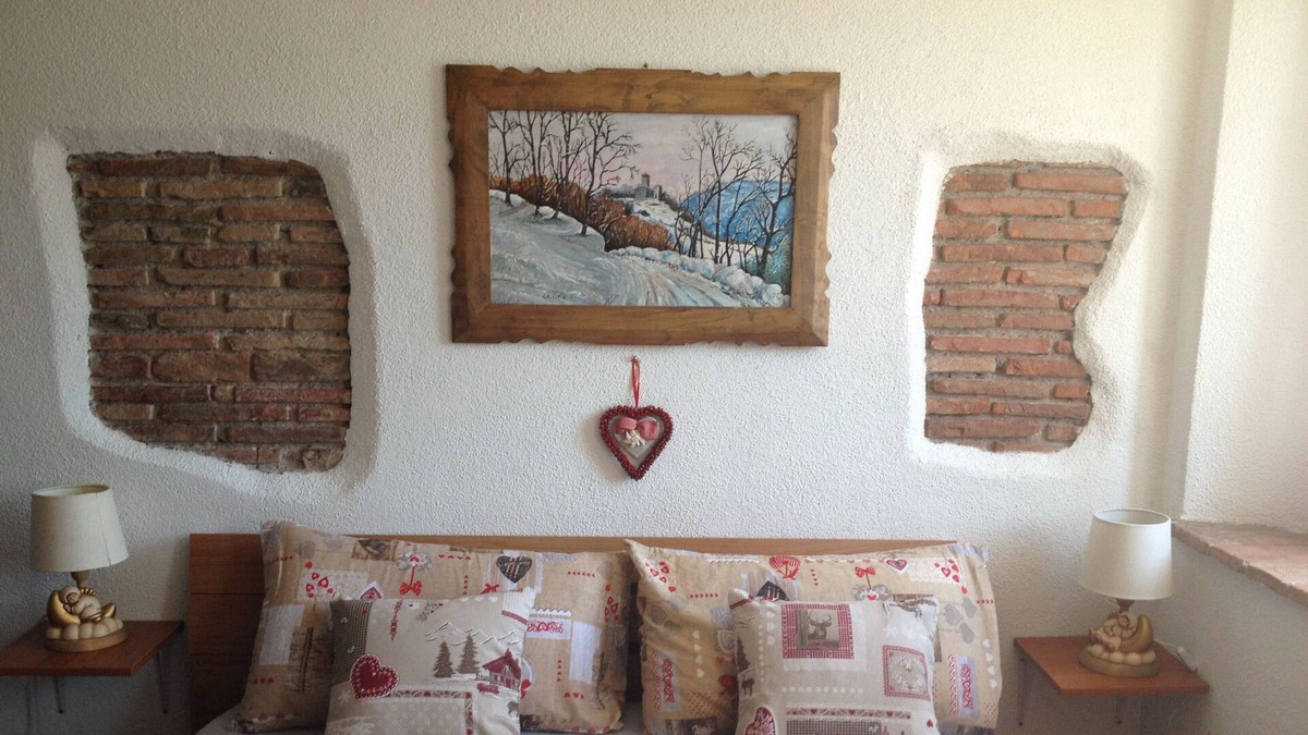 Santa Giustina Apartment | Beautiful Studio "SoleLuna" with garden and views of the Dolomites