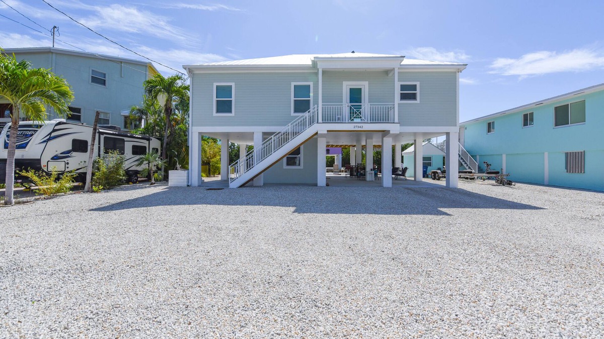 Breezeswept Beach Estates House | Beautiful 3 bed 2 bath canalfront home with great boating access