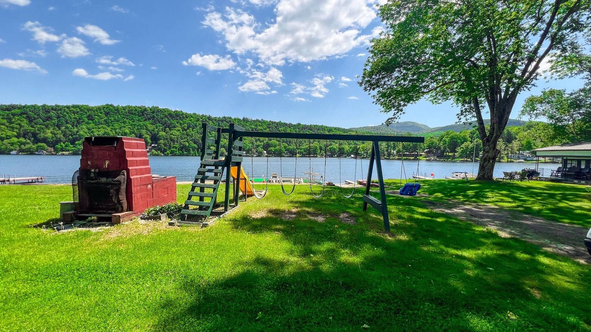 Wells Cottage | Beautiful and serene cottage with beach, dock, lake views, fishing, and A/C