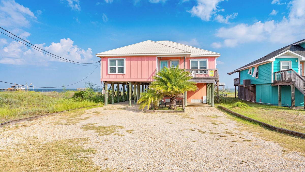 Silver Cay House | Beautiful bayfront home with views of the Dauphin Island Bridge