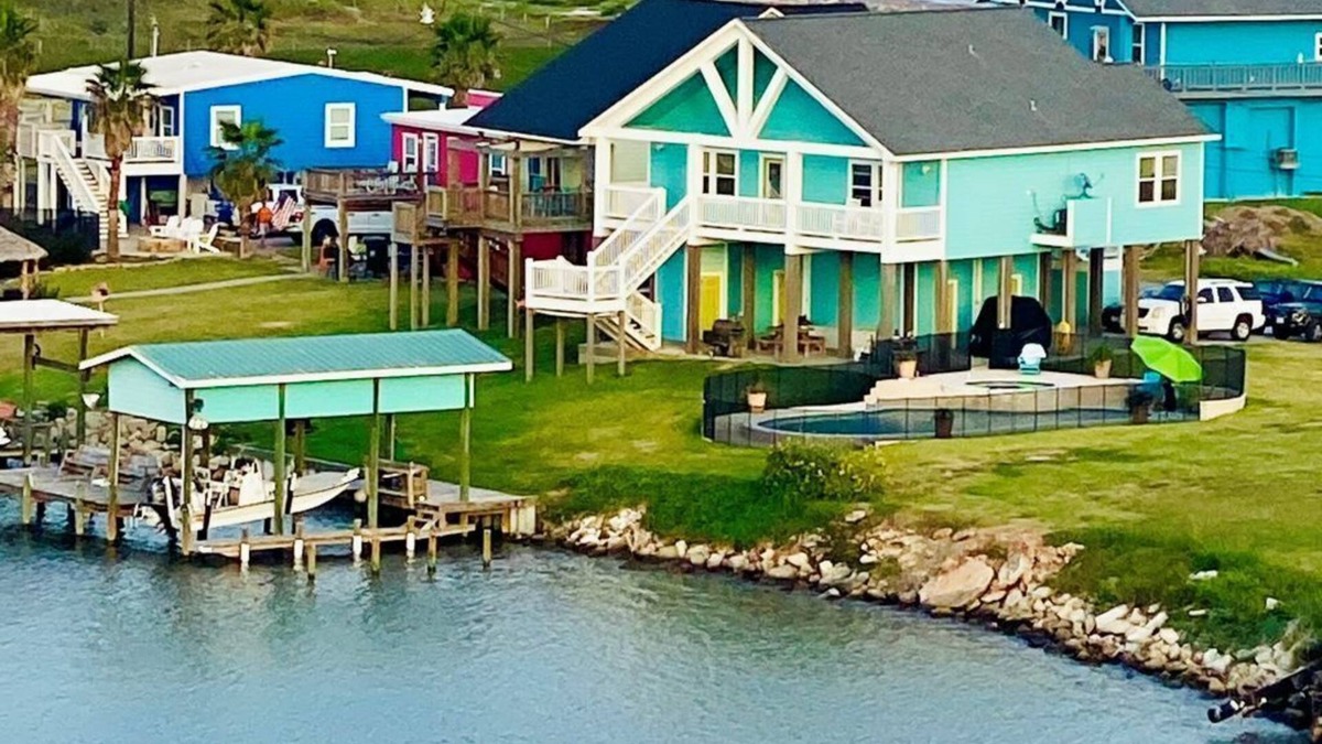 Cedar Lane House | Beautiful beach house boasts a scenic water view from its front and back doors.