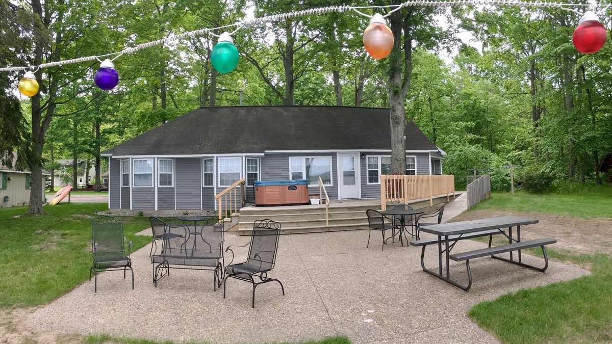 Traverse City Cabin | Beautiful Cabin on the Lake with Hot Tub & Sandy Beach!