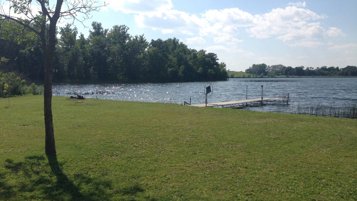 Alexandria House | Beautiful cabin with level lot on Maple Lake. Sunset views on the point!