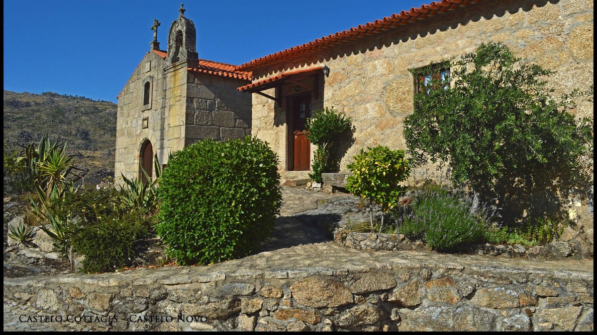 Castelo Novo House | Beautiful flowered granite walkways in the heart of this historic castle village