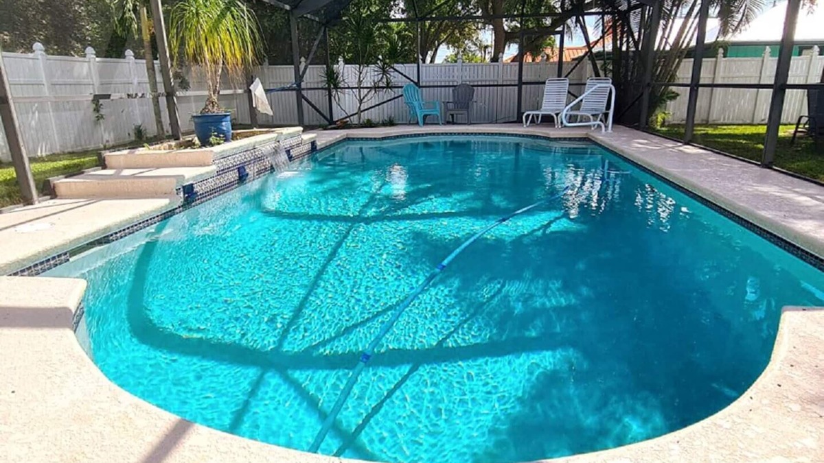 Port Saint Lucie House | Beautiful Home in East Port St Lucie. Heated and Screened Saltwater Pool