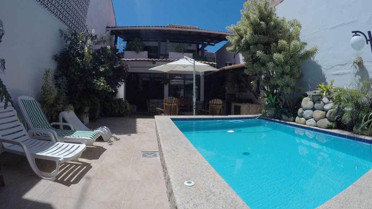 Taio House | Beautiful house with pool and 7 rooms in Arraial - are five suites.