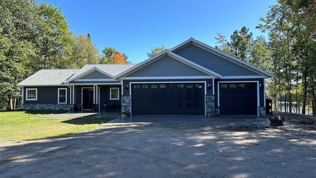 Grand Rapids House | BEAUTIFUL lake front home with a private beach, dock and large yard
