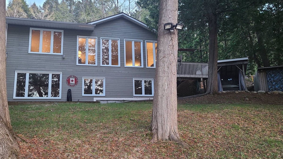 Feronia House | Beautiful lakefront home on Trout Lake! Hot tub and movie room included!
