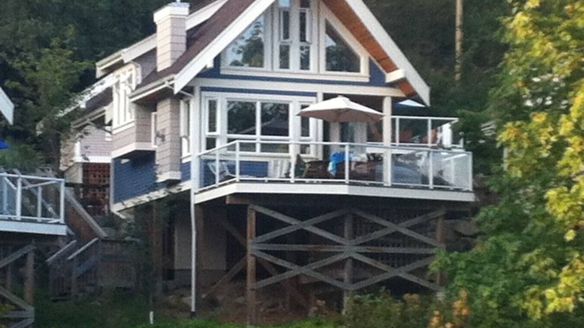 Pender Island Cottage | Beautiful modern cottage with fireplace and large deck at Currents at Otter Bay.