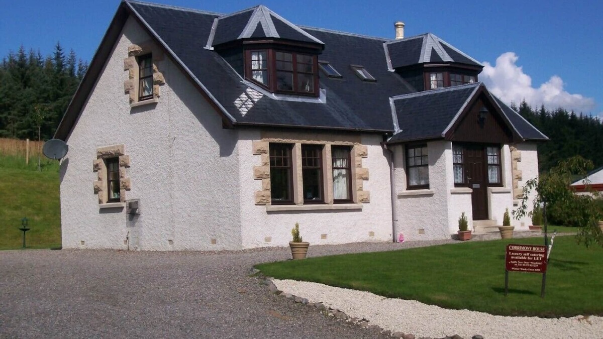 Dulnain Bridge House | Beautiful modern home with fantastic views over the pine forests onto the hills