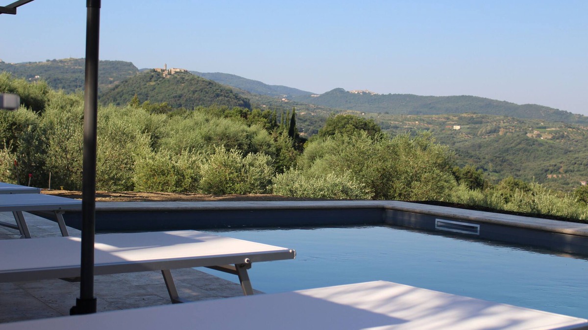 Seggiano House | Beautiful natural stone house with pool in the middle of an olive grove