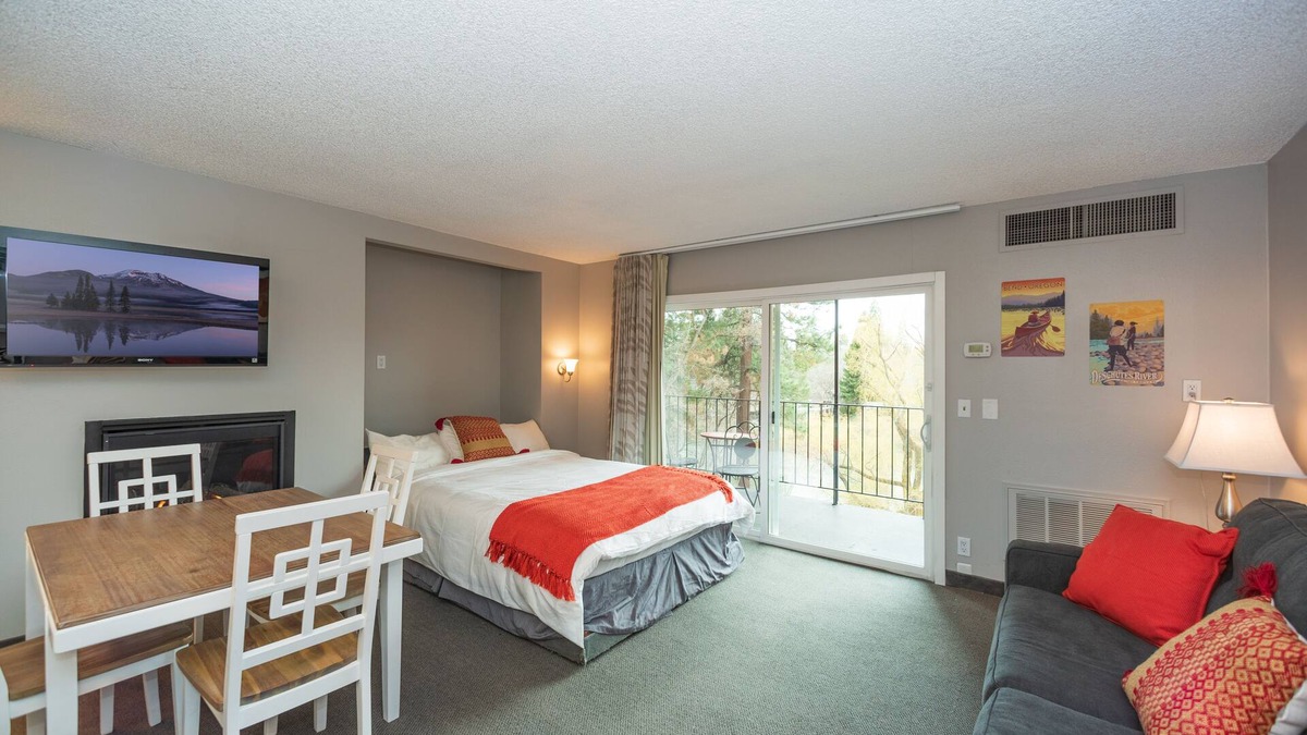 Bend Condo | Beautiful River Views - Walk Downtown ~ Fireplace ~ Patio